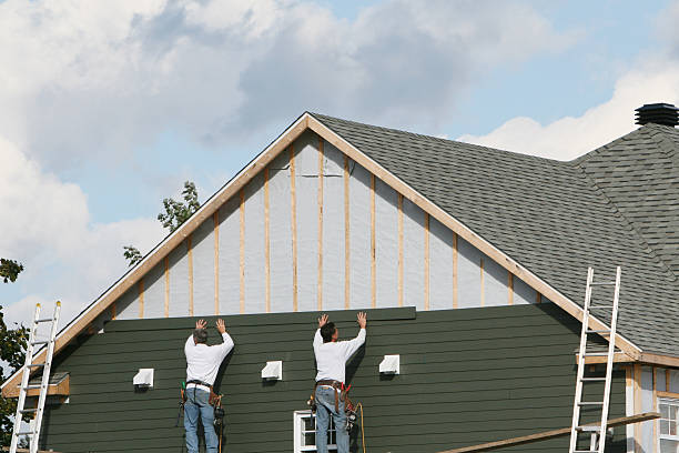 Professional Storm Damage Siding Repair technician working in Kenilworth, PA